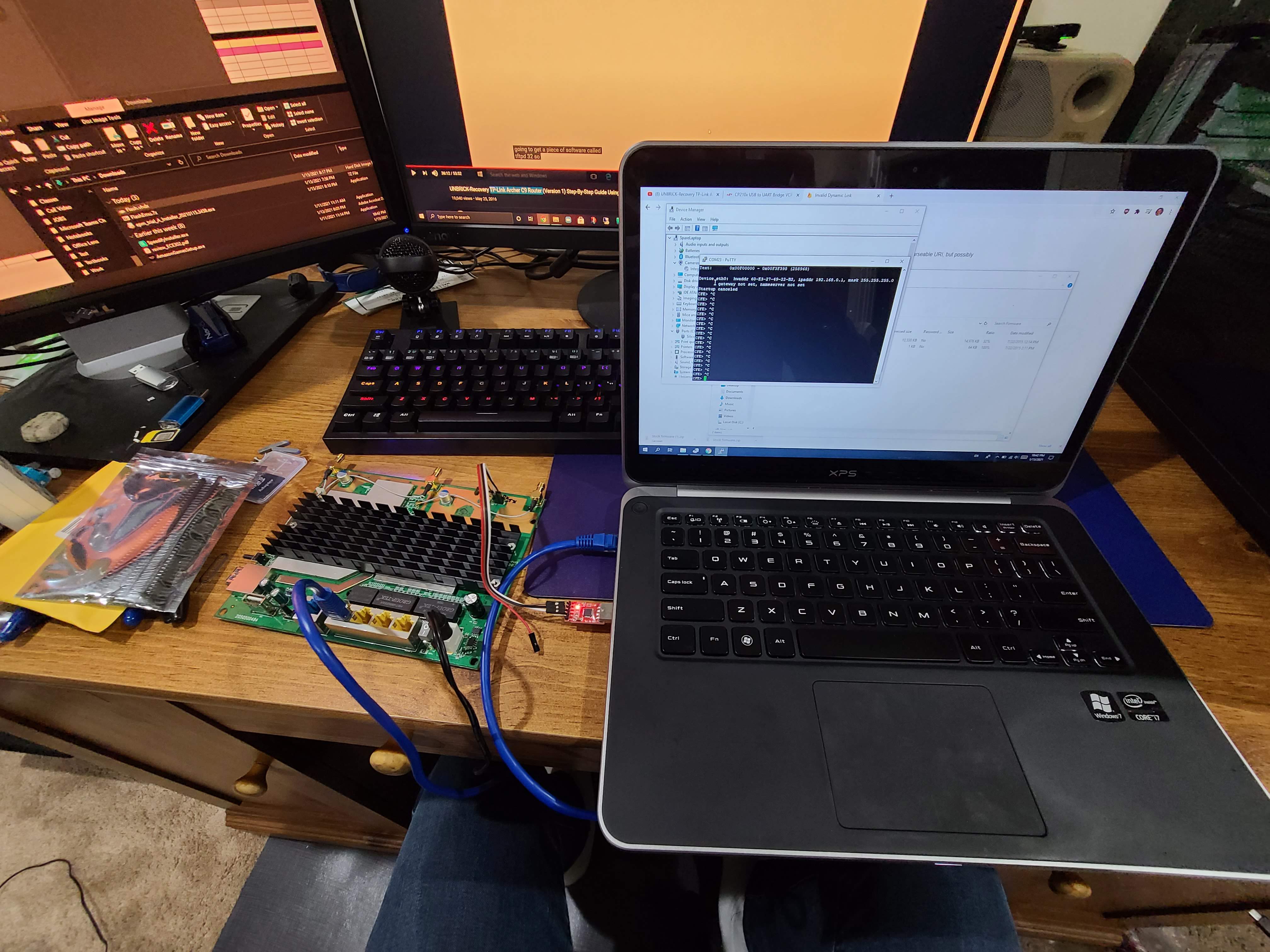 Showing my laptop connected to the router over UART for programming